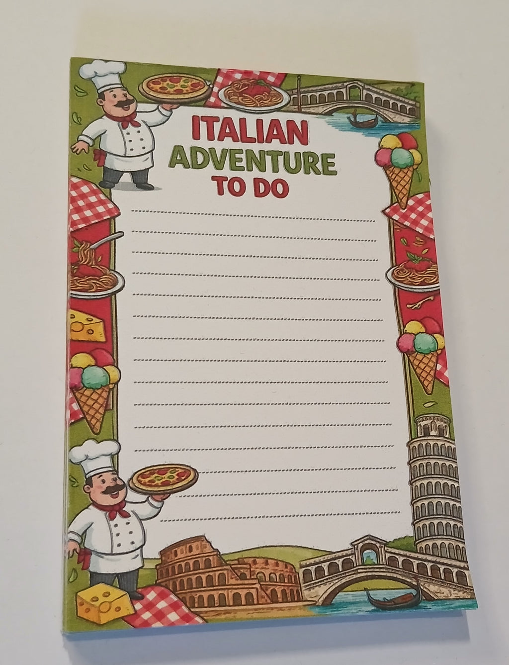 Notepad with Italian-themed design featuring a chef, pizza, and landmarks on a white background.
